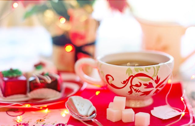 Tea cup and sweets