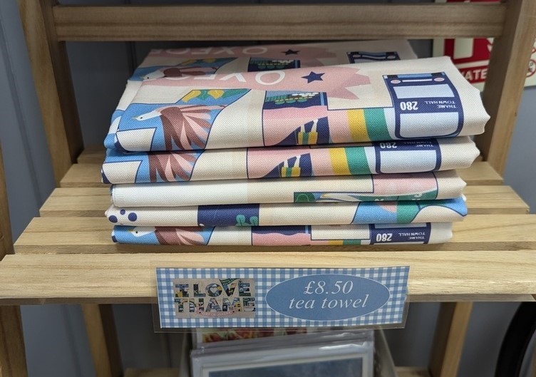 Tea towels on display in Information Centre